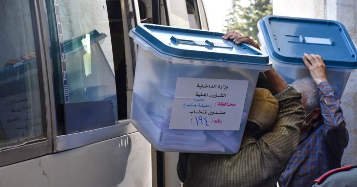 Defiant Assad holds parliamentary elections in Syria