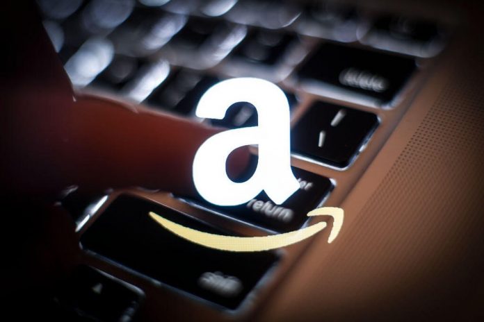 Amazon logo superimposed on photo of computer keyboard
