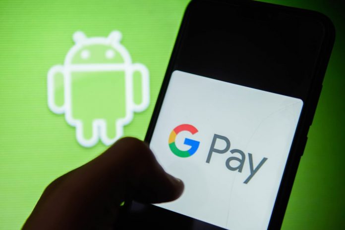 Google Pay logo is seen on an android mobile phone