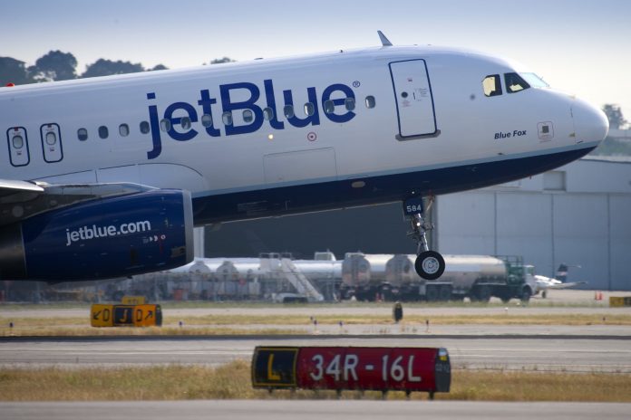JetBlue puts raises, paid parental leave on hold to cut costs in 2021