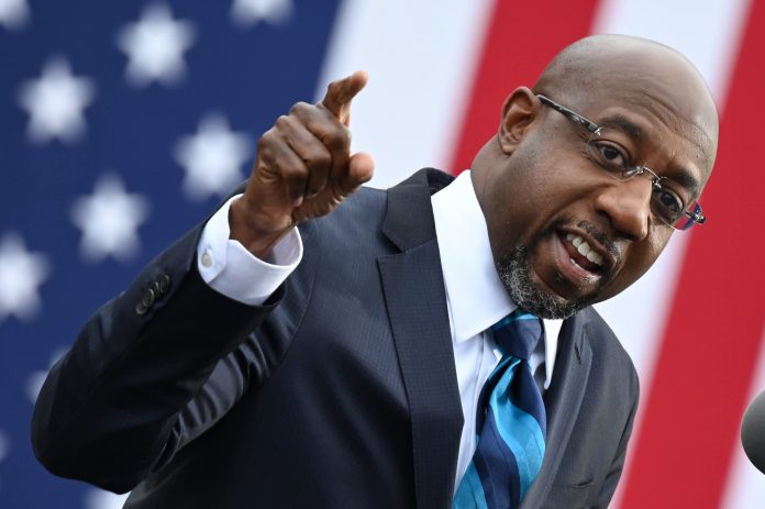 Raphael Warnock projected to win