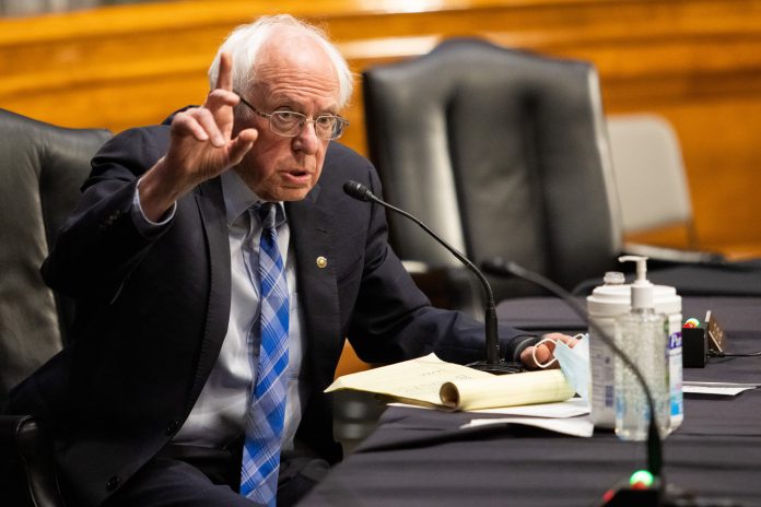 Bernie Sanders opposes cutting income cap for $1,400 payments