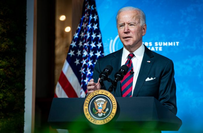 Biden pledges to slash greenhouse gas emissions in half by 2030