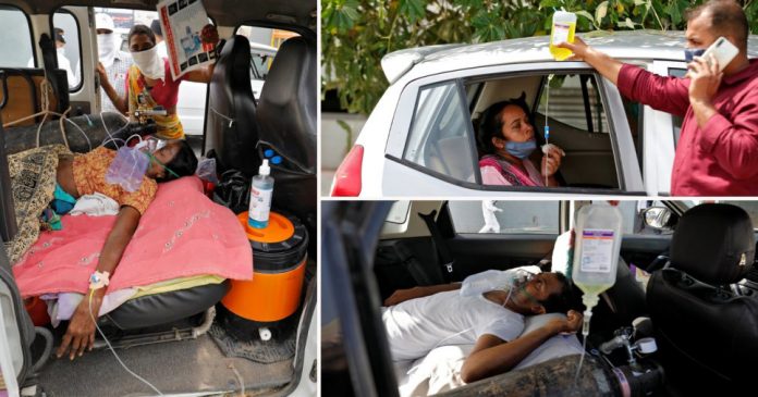 People being treated in their cars as they wait to enter Covid wards in India