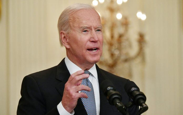 Biden warns states with low immunization rates may see cases rise again