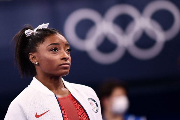Olympic champ Simone Biles out of team finals with medical issue