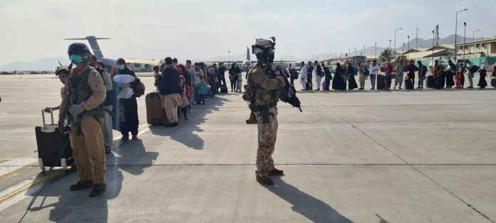 Deadly firefight erupts at Kabul airport as evacuation chaos continues