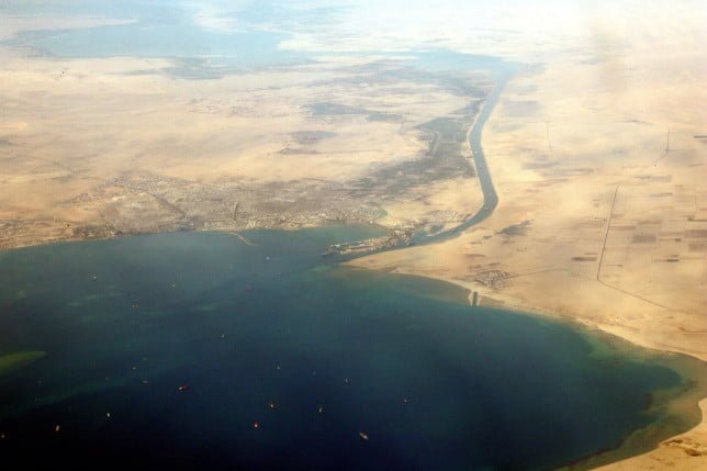 An airial view taken 31 December 2007 shows the southern entrance of Egypt's Suez Canal. Transit fees for ships using Egypt's Suez Canal will increase in 2008 by an average of 7.1 percent, the canal authority said on 31 December. AFP PHOTO/JACK GUEZ (Photo credit should read JACK GUEZ/AFP via Getty Images)