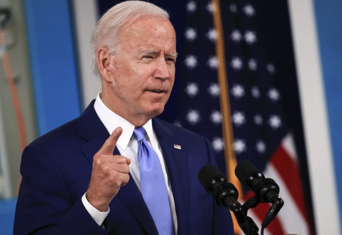 Biden unveils plan to address climate change risks to economy