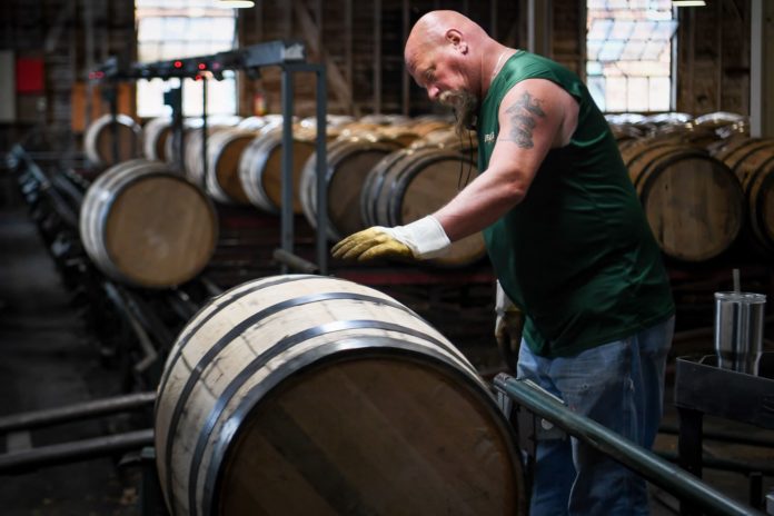 Bourbon distillers face tax bills, higher tariffs after record year for production