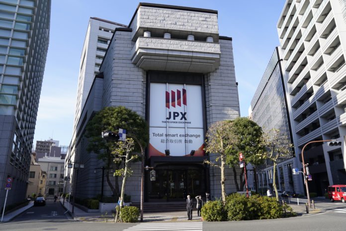 Japan's Nikkei 225 falls more than 2%, paring earlier losses