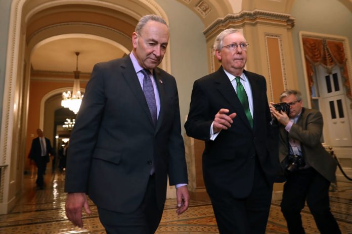 Lawmakers reach deal on short-term debt ceiling increase, Schumer says