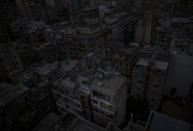 Mandatory Credit: Photo by Daniel Carde/ZUMA Press Wire/REX/Shutterstock (12413836w) A residence, bottom center, is lit by the electricity provided from a generators while most of the buildings are dark as they experience electrical outages in Beirut, Lebanon on Sept. 2, 2021. Lebanon has been experiencing electrical outages as the state only provides 2-3 hours of electricity per day to Beirut, so people must rely on solar power and generators that require diesel fuel, which is not easy to obtain because it is sold on the black market at higher rates. For a private generator service, providers charge LL1 million or about $666.67 at the official exchange rate per 5 amps, enough to power an AC unit for on room, a cost higher than a month?s rent for many Lebanese, which is more than many can afford. Electricity shortages in Beirut, Lebanon - 02 Sep 2021