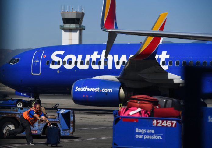 Southwest Airlines shares tumble after mass flight cancellations