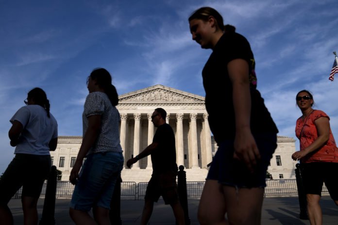 Supreme Court starts term with first in-person arguments since Covid pandemic began