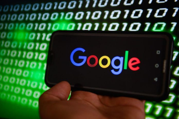 Google logo is seen on a mobile phone