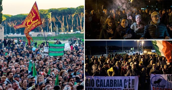 People protest during a demonstration organized by No Green Pass and No Vax movements against the Green Pass Covid-19 health certificate, at Circo Massimo on November 20, 2021 in Rome, Italy. 