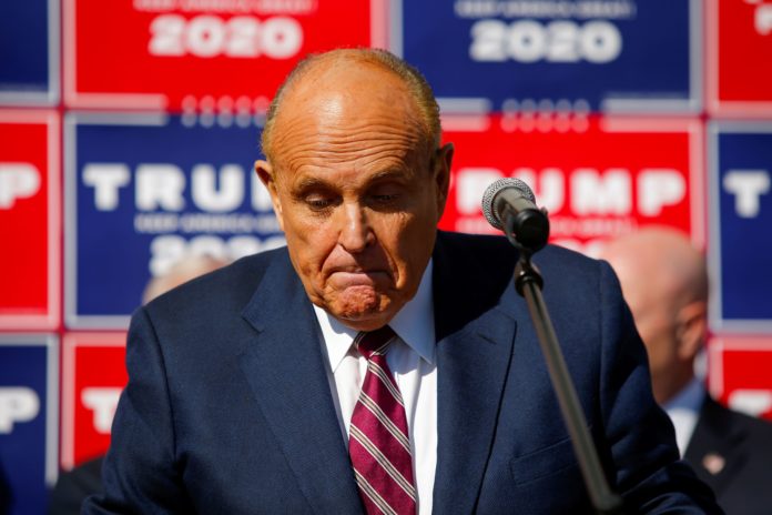 Trump lawyer Rudy Giuliani seeks to block feds from search warrant items