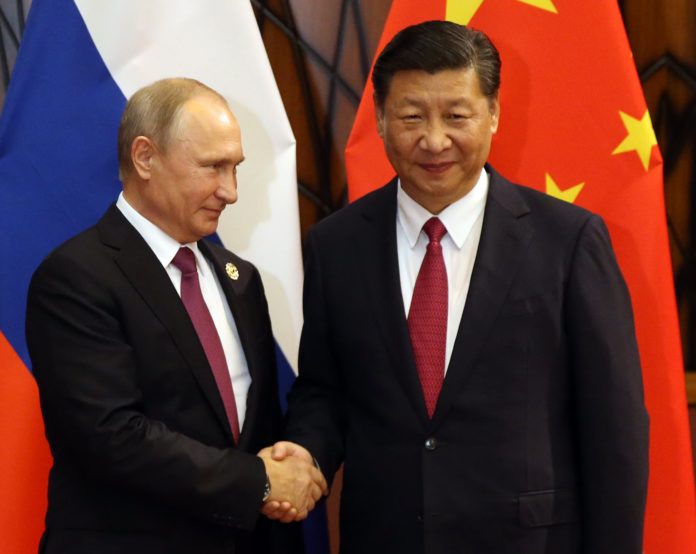 China's Xi and Russia's Putin talk geopolitics in video call