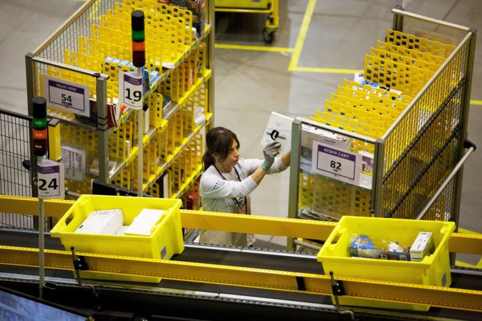 Amazon cuts paid Covid leave for workers as CDC guidance shifts