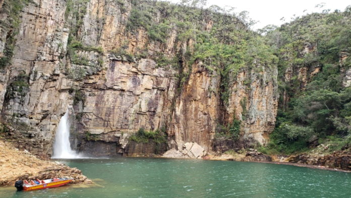 At least 6 dead after a massive wall of rock falls on boaters in a Brazilian lake