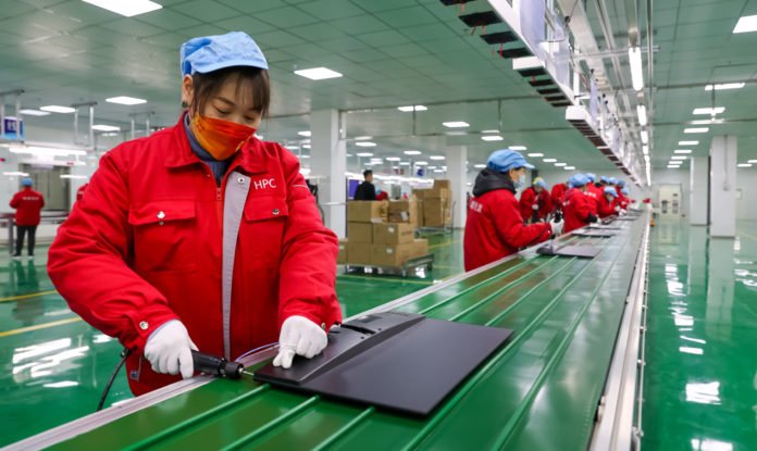 China's December factory activity edges up despite virus outbreaks