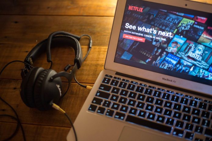 The Netflix website seen displayed on a Apple MacBook Air