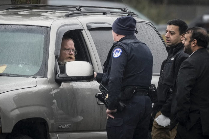 Dale Paul Melvin, arrested for parking SUV in front of Supreme Court, has returned
