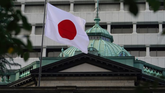 Bank of Japan maintains huge stimulus, warns of growth risks from Ukraine crisis
