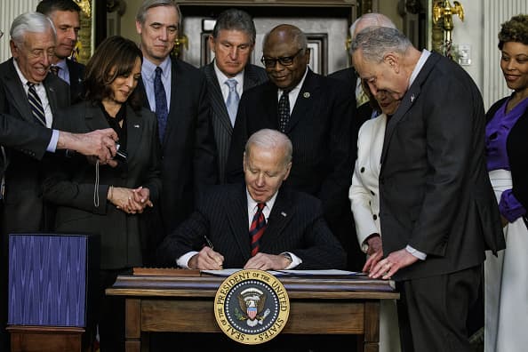 Biden signs government funding bill with Ukraine aid