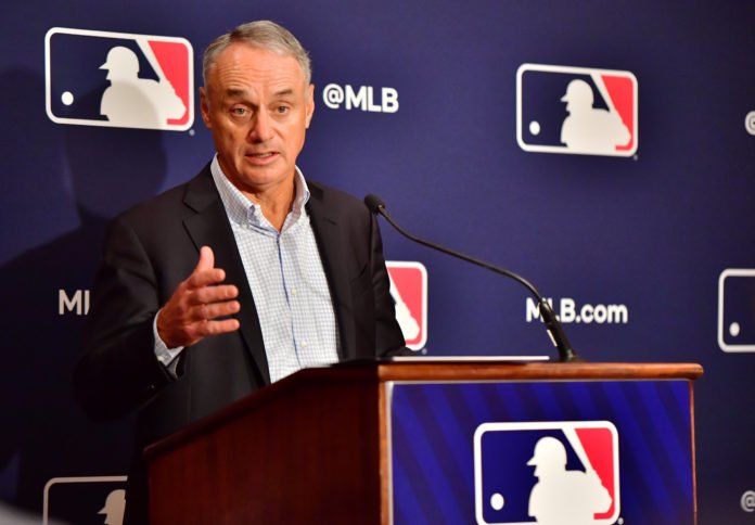 MLB owners and players reach tentative labor deal