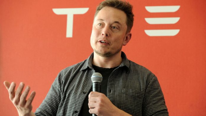 Tesla wants to split its stock so it can pay a stock dividend; shares gain