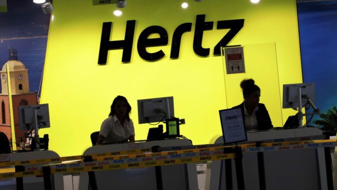 Hertz CEO says rebounding business travel could tighten an already-constrained used car market