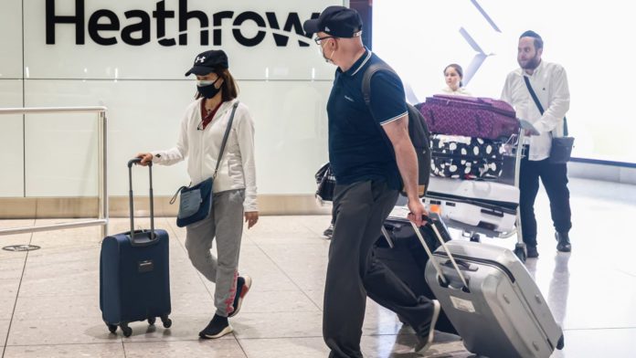 London's Heathrow passenger caps extended until late October as travel strains continue