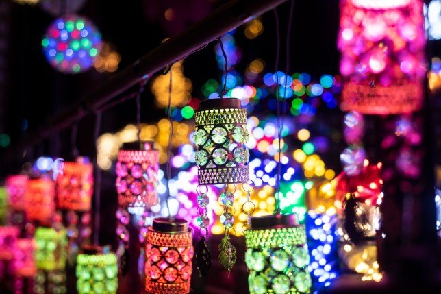 Colourful Diwali lanterns and candles.