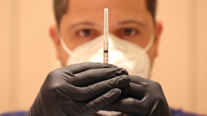 FDA says most people probably need only one annual vaccine shot