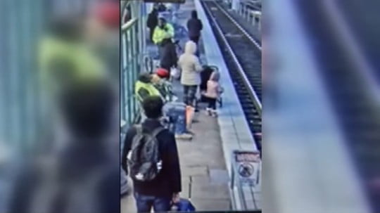 Woman pushes three-year-old girl 'face first' onto train tracks in horror attack