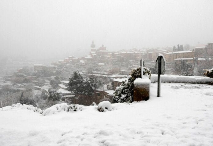 This picture shows the mountain village of Valldemossa covered in snow, on the Spanish Balearic island of Mallorca, on February 27, 2023. - Towns across the Balearic island of Mallorca, including Valldemossa and Lluc, today were blanketed in snow and temperatures dropped to minus 2 degrees Celsius (28.4 Fahrenheit). Forecasters warned up to 16 inches could fall in 24 hours and a red weather alert was issued as Storm Juliette slammed. (Photo by JAIME REINA / AFP) (Photo by JAIME REINA/AFP via Getty Images)