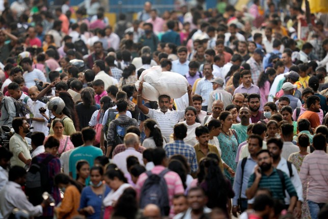 People throng a market place in Mumbai, India, Monday, April 24, 2023. The United Nations says India will be the world???s most populous country by the end of April, eclipsing an aging China. (AP Photo/Rajanish Kakade)