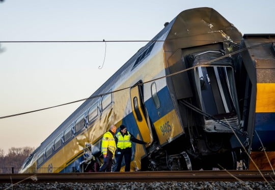 Emergency services work at the site of a derailed night train in Voorschoten on April 4, 2023. - At least one person died and 30 were injured early on April 4 when a high-speed passenger train slammed into heavy construction equipment and derailed near The Hague, Dutch emergency services said. (Photo by Remko de Waal / ANP / AFP) / Netherlands OUT (Photo by REMKO DE WAAL/ANP/AFP via Getty Images)