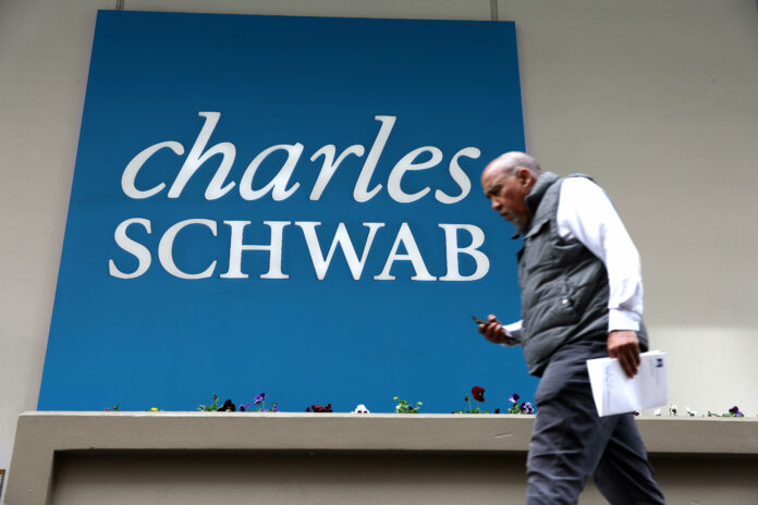 Buy Charles Schwab shares to ride out potential summer volatility, Deutsche Bank says