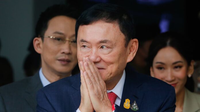 Thai king reduces former PM Thaksin's prison sentence to one year