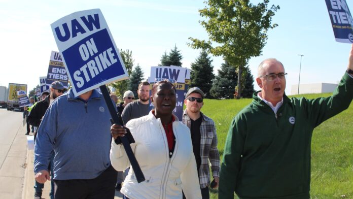 Ford, UAW reach labor deal pending union leadership approval